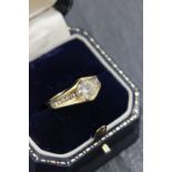18ct Yellow Gold Diamond ring with central stone of 1ct approx and Diamond shoulder