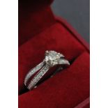 14ct White Gold Diamond ring with Diamond cross over shoulders 1.2 ct's
