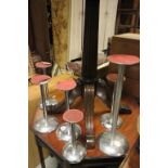 Six Vintage Shop Display Chrome Hat Stands together with Quantity of Chrome Clothes Stands (some