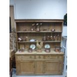 19th century Pine Dresser, shelved back with hooks over Three Drawers and Two Cupboard Doors