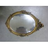 Gilt Scroll Framed Oval Mirror