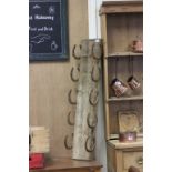 Rustic Wine Rack made from a Plank and Horse Shoes