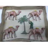 Vintage set of four metal Camels plus tree and figure