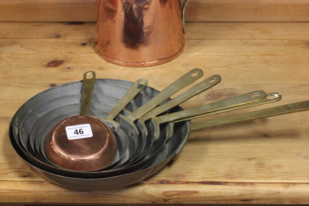 Set of Seven Graduating Copper Frying Pans