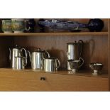 Silver Plated Four Piece Tea Service together with a Silver Plated Sugar Bowl, Jug and Water Jug and