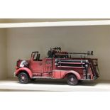 Tin plate model of a vintage Fire Truck