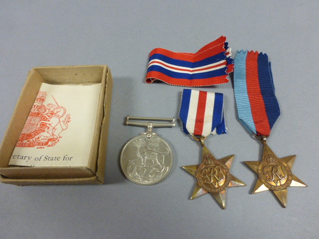 Three WWII medals, Francce and Germany star 39-45 star, 39-45 medal boxed with paperwork