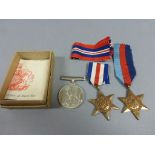 Three WWII medals, Francce and Germany star 39-45 star, 39-45 medal boxed with paperwork