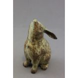 Vintage iron dooor stop in the form of a hare