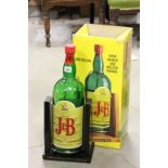 Advertising one gallon J&B Whisky bottle and cradle