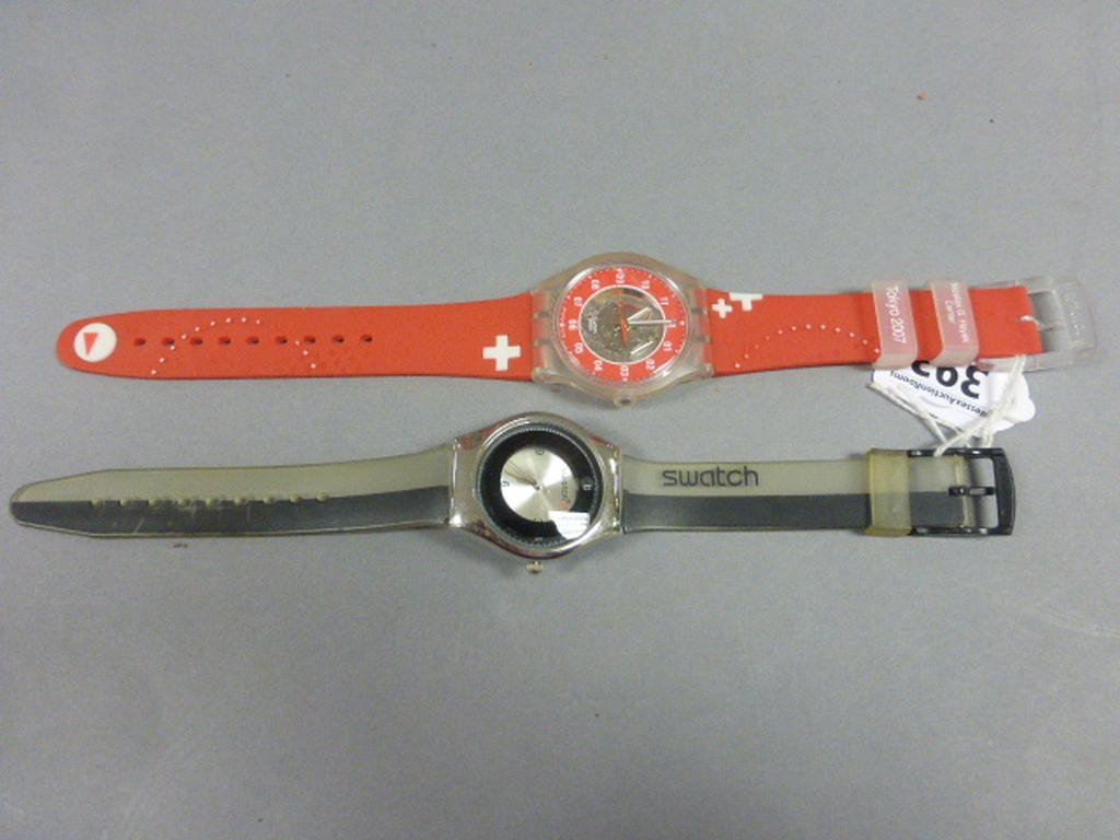 Two Swatch watches