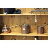 Pair of Graduating Copper Lidded Pots with Wrought Iron Handles and another Copper Lidded Pot with