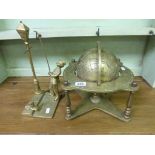 Brass Globe and a Brass Lamp Lighter Figure