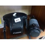 Canon Camera in Case with Lens