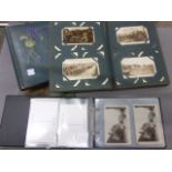 Over 100 military postcards in album plus 3 empty albums and album of mainly reproduction cards