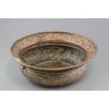 Large Copper Bowl with heavily embossed pattern in the form of stylised Fish and Floral Scrolls