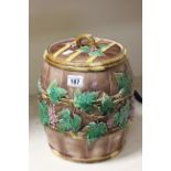 George Jones 19th C majolica biscuit barrel decorated with leaves with blue raised mark to base