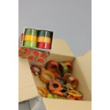 Mixed lot of vintage coloured Bakerlite napkin rings including animal