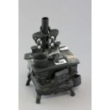 Cast miniature Arga stove