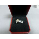 14ct White Gold diamond ring of 1.2 ct's central stone 1ct approx.