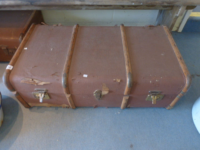 Canvas covered travel trunk with collectable items