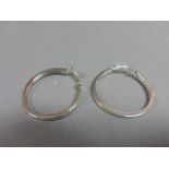 Pair of large silver and CZ hoop earrings