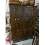 Mid 20th century Oak Wardrobe with Two Linenfold Panel Doors