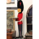 Wooden dumb waiter in the form of a soldier