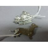 White metal cat brooch and a similar dog