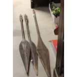 Three Tribal Ethnic Carved Wooden Paddles