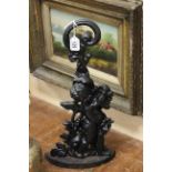 Cast Iron Doorstop featuring a Putti