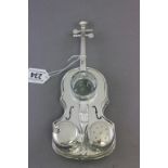 A silver plated novelty condiment set in the form of a cello