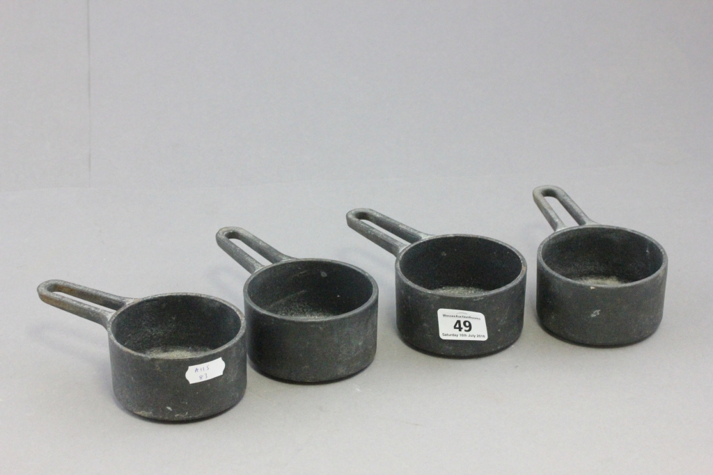 Set of Four Small French Cast Iron Pans marked to base Castrione France