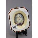 A reproduction portrait minature of Elizabethan lady, in an octagonal ivorine and faux tortoiseshell