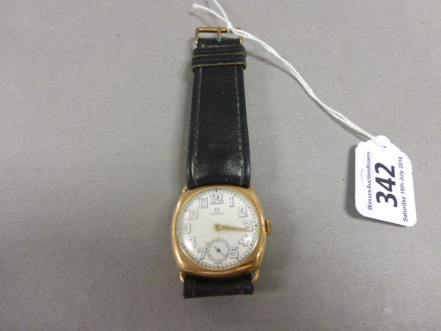 A 1930s Omega 14ct yellow gold gentlemans wristwatch, with Arabic numerals and a subsidiary second