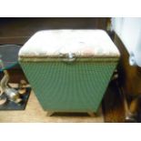 A green painted Lloyd Loom style linen bin