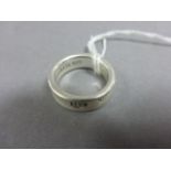 A Tiffany & Co sterling silver ring, with inscription both on the interior and exterior
