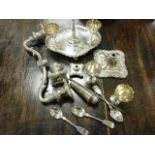 A basket of miscellanous silver plated items to include twin branch candelabra, egg cruet etc