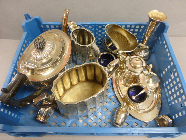 A box of silver plated items to include; part tea sets, cruet sets etc