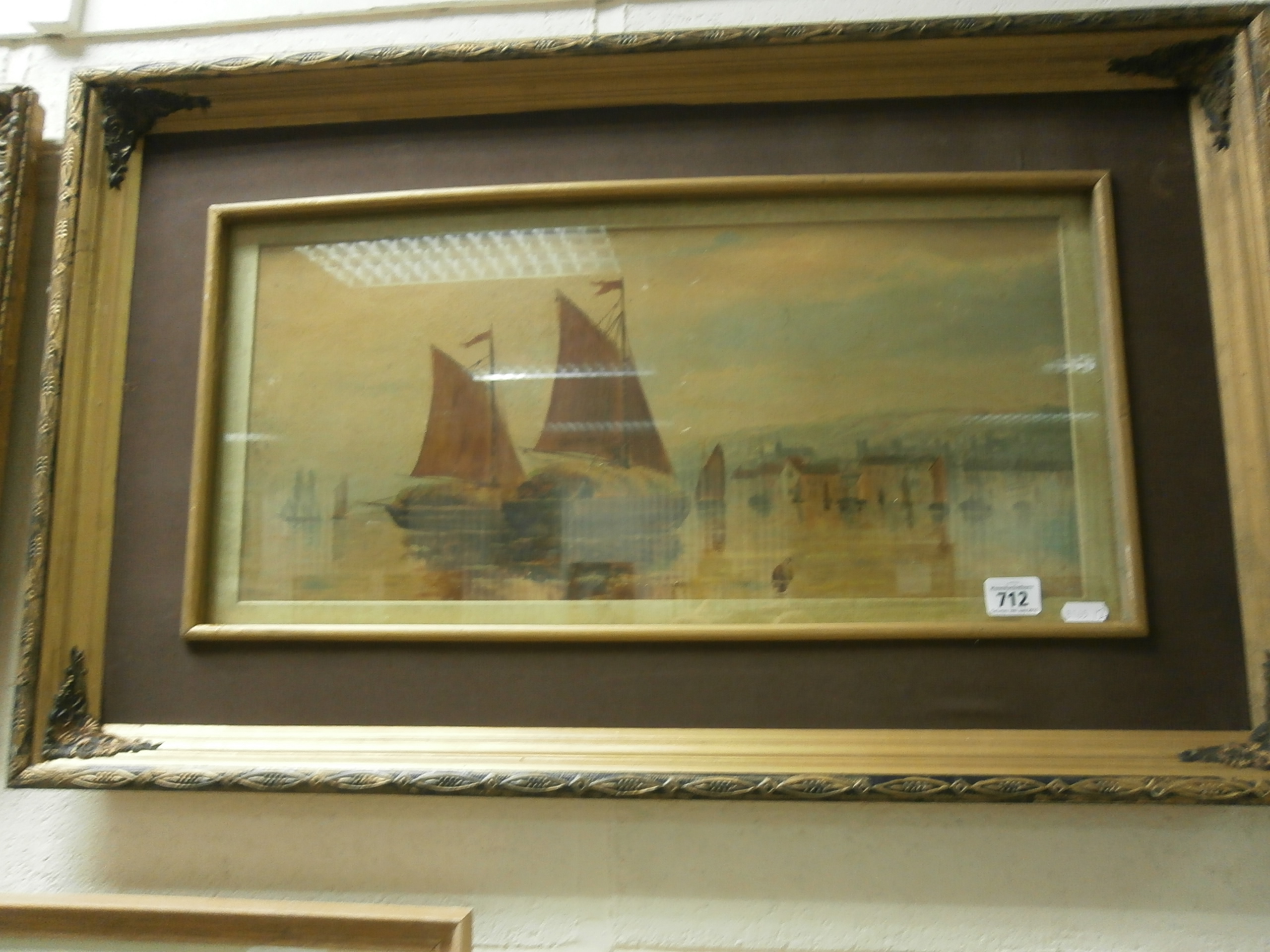 19th century British school; a gilt framed oil painting of an English coastal scene with fishing