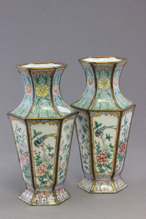 A pair of Chinese Canton enamel hexagonal vases, decorated with panels of birds and flowers, 23cm