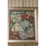 A studio framed impressionist oil painting still life; a summer table setting with flowers