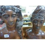 Pair of Ethnic Hardwood Carved Busts of a Tribal Man and Woman