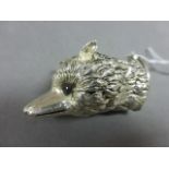 A silver plated fox head vesta case