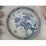 A Chinese porcelain blue and white plate; bearing pseudo character mark to base, decorated with