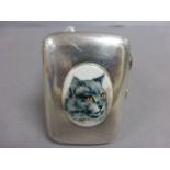A silver calling card case with enamel image of a persian cat