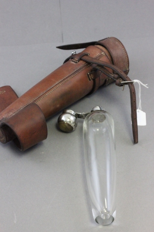 A tapering glass flask, with silver plated hinged lid, in original carrying case