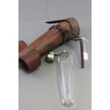 A tapering glass flask, with silver plated hinged lid, in original carrying case