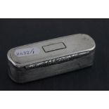 A George III hallmarked silver snuff box; of rectangular form with rounded corners; with ribbed