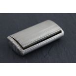 A George III hallmarked silver snuff box; of rectangular form with ribbed decoration; the hinged lid